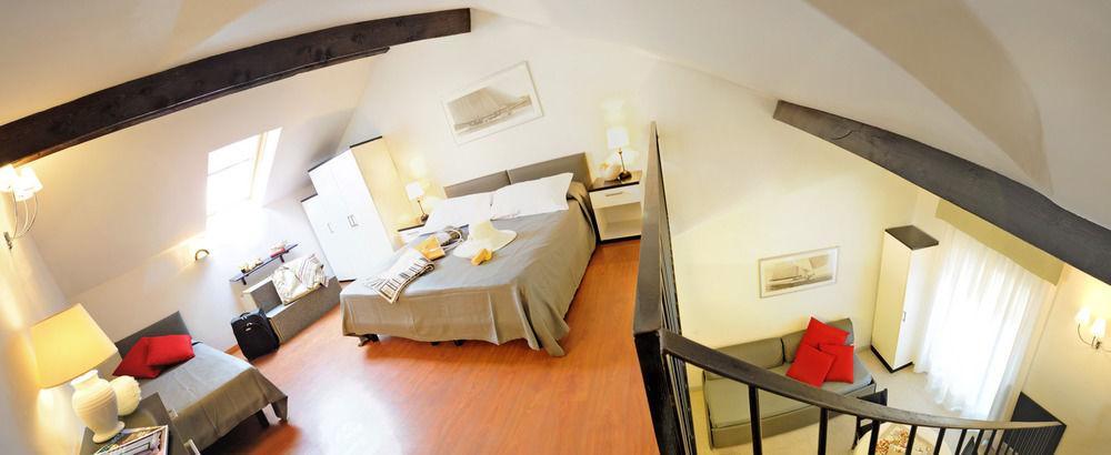 Le Terrazze Aparthotel อาลัสซิโอ ภายนอก รูปภาพ