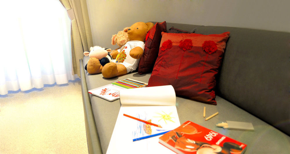 Le Terrazze Aparthotel อาลัสซิโอ ภายนอก รูปภาพ
