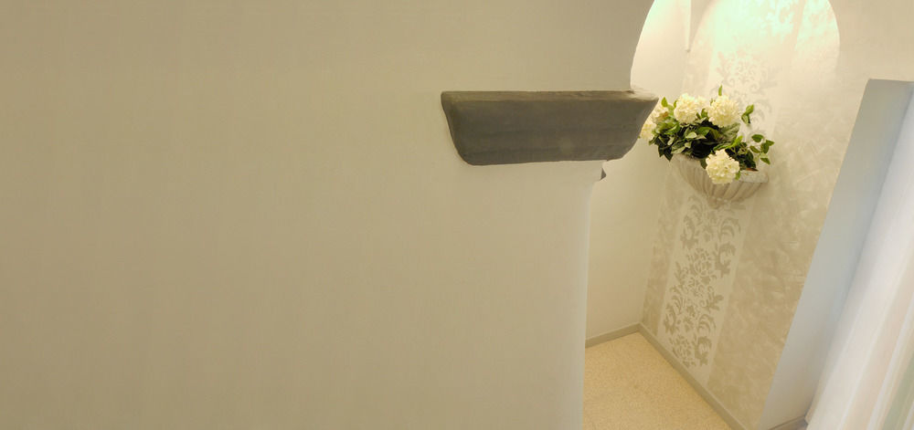 Le Terrazze Aparthotel อาลัสซิโอ ภายนอก รูปภาพ